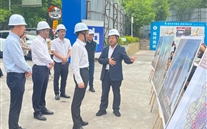 大渡口区常务副区长谢小刚调研ng28南宫中心项目，共破建设难题促发展